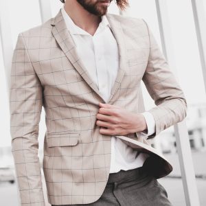 portrait-sexy-handsome-fashion-male-model-man-dressed-elegant-beige-checkered-suit-posing-street-background portrait of sexy handsome fashion male model man dressed in elegant beige checkered suit
posing on the street background
